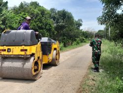 Satgas TMMD ke-126 Laksanakan Pengerjaan Hotmix Jalan di Desa Longok
