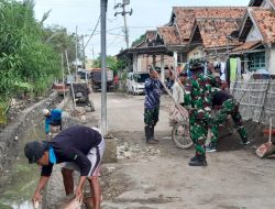 Satgas TMMD ke-126 Bersama Warga Lanjutkan Pembangunan TPT di Desa Longok