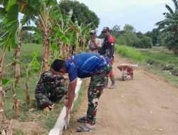 Anggota Satgas TMMD ke-126 Lanjutkan Pembangunan Jalan Rabat Beton