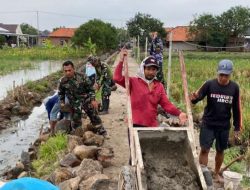 Anggota Satgas TMMD ke-126 Kembali Lanjutkan Pembangunan TPT di Desa Longok