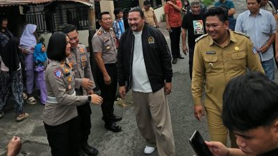 Kapolres Bitung Pimpin Pengamanan Kunjungan Anggota Komisi III DPR RI ke Lokasi Kebakaran di Pateten I